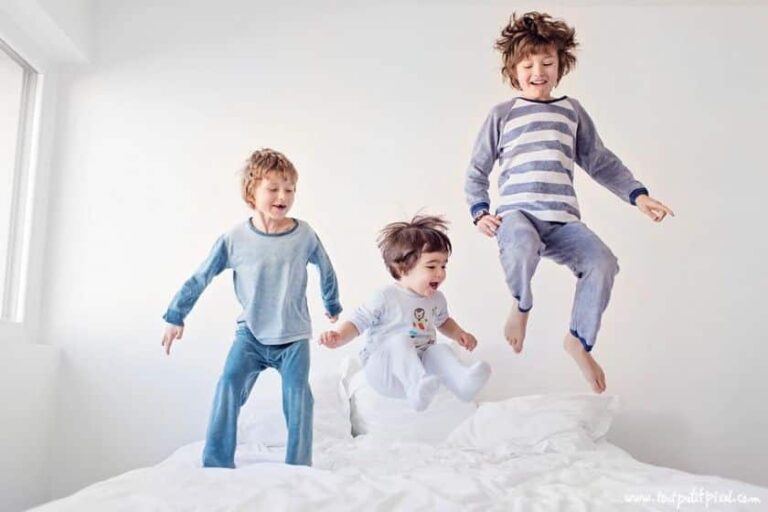 Kids Jumping On a Bed